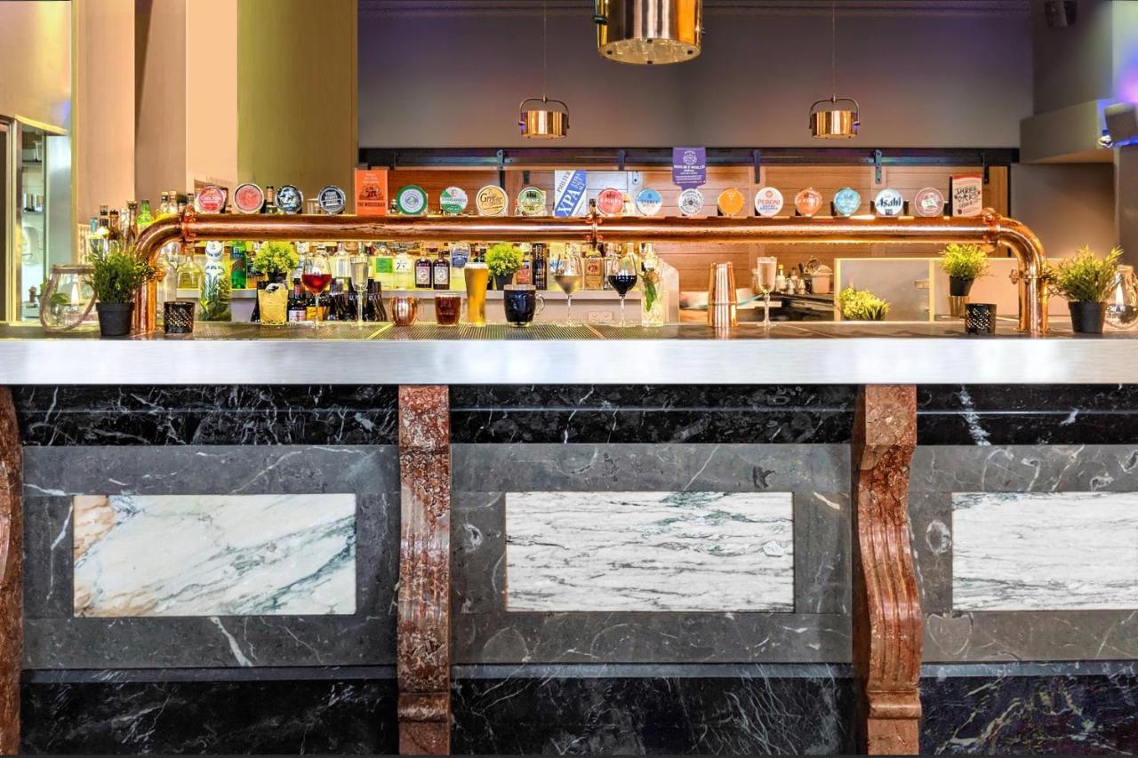 فندق سيدني هاربور ماريوت أت سيركولار كواي المظهر الخارجي الصورة The bar at the hotel